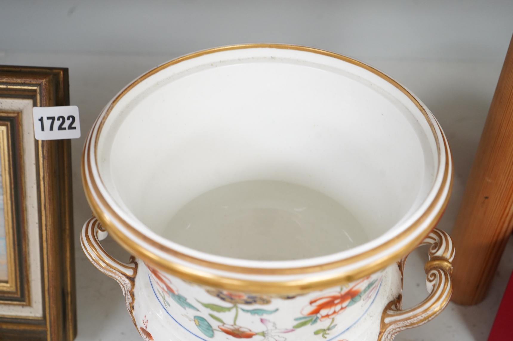 An early 19th century English porcelain campana vase and matched cover, with twin handles, 33cm high